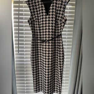 Gorgeous black and white houndstooth sheath dress. Size 12.